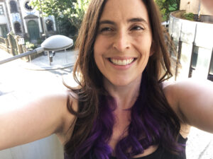 Gigi with purple hair
